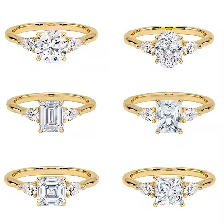 Kolmikivinen IGI-sertifioitu laboratoriotimanttisormus 14K täyskullasta. Saatavilla Round, Oval, Emerald, Radiant, Asscher ja Princess -leikkauksilla.